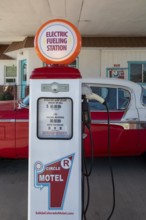 Salida, Colorado, An electric car charging station., made from gasoline pumps, at the Circle R