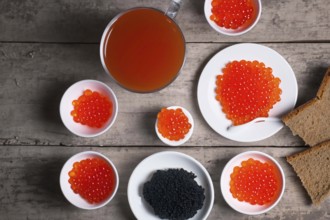 Different kinds of caviar with bread and beverages, AI generated