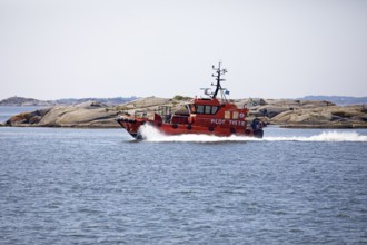 Red boat of the Swedish Maritime Administration in the harbour of Gothenburg, Västra Götalands län,