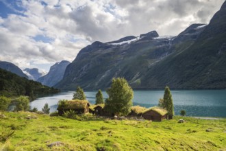 Traditional cabins on the shores of Lake Lovatnet, Breng seter, Loen, Stryn, Norway, Europe