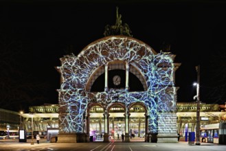 Archway on the station square, light installation at dusk, Lilu, Light Festival 2023, Lucerne,