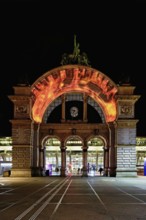 Archway on the station square, light installation at dusk, Lilu, Light Festival 2023, Lucerne,