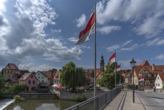 View of the old town, bridge with waving flags in front, Lauf an der Pegnitz, Middle Franconia,