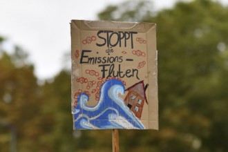 Heidelberg, Germany, 24th September 2021: Sign saying 'Stop emission floods' in German during