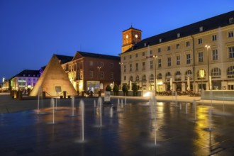 Water feature and illuminated pyramid on the market square, blue hour, Karlsruhe,