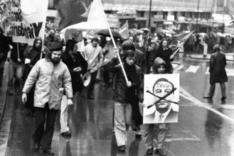 Against the war in Vietnam, supporters of the peace movement demonstrated in Essen, Germany, on 25