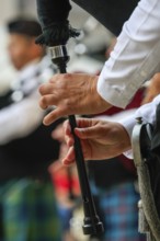 Fingers of a bagpipe player on the instrument, bagpipe orchestra, pipe concert, Sigmaringen,