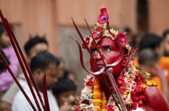 GUWAHATI, INDIA, AUGUST 19: Priest dance in the beat of Dhol (Drum) during the annual