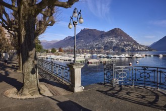 Lantern, railing, trees, promenade, shadow, lake, mountains, blue sky with veil clouds, Lake