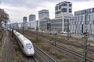 Railway line in Düsseldorf, along Toulouser Allee, residential area, office building, on former