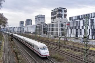 Railway line in Düsseldorf, along Toulouser Allee, residential area, office building, on former