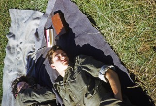 Schoolboys taking part in military exercises as army cadets, South of England, United Kingdom, late