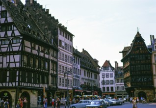 Historic medieval half-timbered buildings on the Place de la Cathedrale, city centre of Strasbourg,