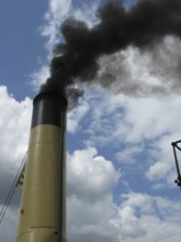 Smoke from the steamship chimney