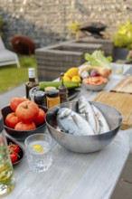 Fresh ingredients for cooking on the outdoor table