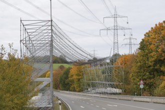 A scaffold with steel net as protection over a road, safety measure due to work on an overhead line