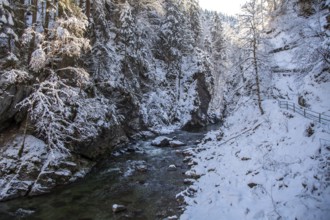 Winter, snowy landscape, river Breitach and hiking trail through the Breitachklamm gorge near