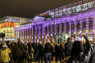 Stuttgart lights up. Long shopping night in the city centre with a light show. The Königsbau is