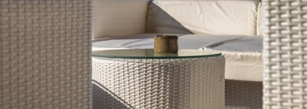 Detail photo, ashtray and wicker chairs on a terrace, Crete, Greece, Europe