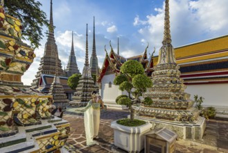 Wat Pho Temple is Bangkok's oldest Buddhist monastery near the Grand Palace. Four chedis are among