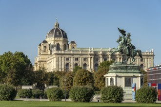 The equestrian statue of Archduke Karl on Heldenplatz and the Natural History Museum in Vienna,