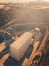 Bird's eye view of industrial buildings in the quarry at sunset, Magstadt, Germany, Europe