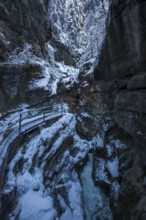 Winter, snowy landscape, river Breitach and hiking trail through the Breitachklamm gorge near