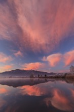 Cloudy mood, dawn, mountains reflected in lake, winter, hoarfrost, Loisach-Lake Kochel moor, behind