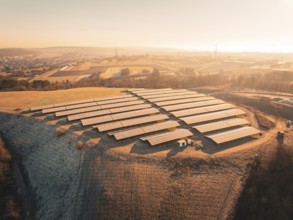 Hilly landscape with extensive solar installations in the morning light, Magstadt, Germany, Europe