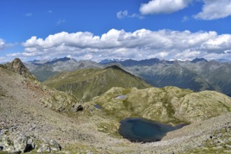 View from the Weiße Spitze to the mountain lakes on the way from the Brugger Alm, on the horizon