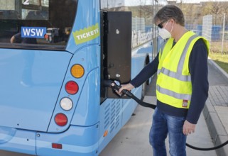 Herten, North Rhine-Westphalia, Germany - Wuppertal hydrogen bus fills up with H2 hydrogen at an H2