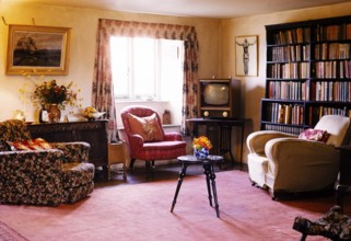 Living room of a holiday home with television and furniture, 1962