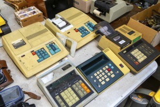 Vintage mechanical calculator adding machines on display at auction, UK