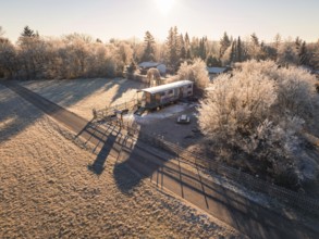 Caravan on a frost-covered meadow at sunrise, Kita, Gechingen, Hecken and Gäu region, Calw