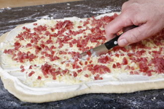 Swabian cuisine, preparation of savoury yeast plait with smoked meat, salty wreath bread, yeast