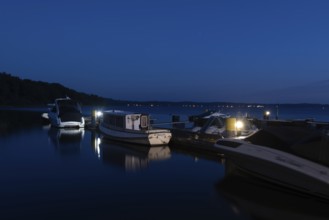 Motorboats on Lake Plau, Ganzlin, Mecklenburg-Western Pomerania, Germany, Europe