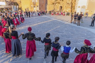 Group of people performing traditional Greek dance, Chania, Crete, Greek Islands, Greece, Europe