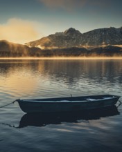 Frosty morning atmosphere during sunrise at Lake Hopfensee in the Allgäu in Bavaria, Germany,