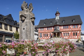 Historic town hall, Renaissance half-timbered house, fountain for fallen soldiers of the 1st World