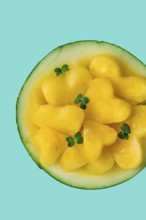 Yellow mini watermelon, Sliced in the shape of a heart, top view, no people, close-up, selective