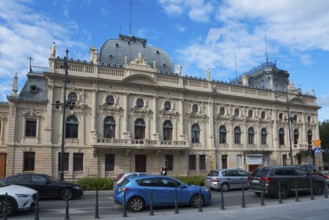 Magnificent historical building with richly decorated facade and baroque elements, in the