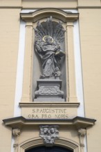 Figure of St Augustine in a niche above the entrance portal of St Augustine's Church,