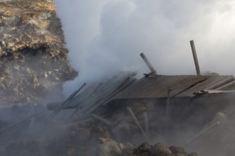 Steam evaporating of the ground at Gunnuhver, close to Reykjanes lighthouse. Gunnuhver is the heart