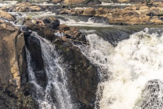 Anglers at the Tad Lo waterfall in the Bolaven Plateau, Laos, Asia