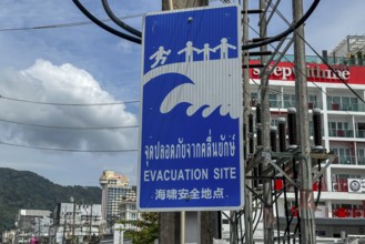 Tsunami Hazard Zone. Warning sign, signposting of escape routes in the event of another seaquake.