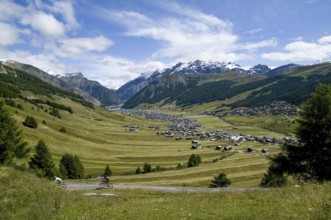 View of the high valley of Livigno, with Lago di Livigno in the background, in the province of