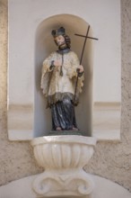 Sculpture of St Nepomuk in a niche on a residential building, Simmelsdorf, Middle Franconia,