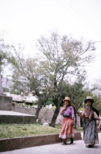 Two women walking in the park, Ayacucho, Peru, South America 1962, South America