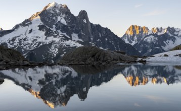 Morning atmosphere, mountain landscape at sunrise, reflection in Lac Blanc, mountain peaks Grandes