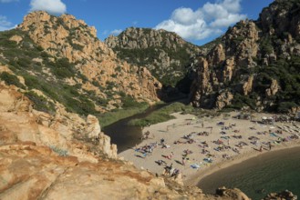 Red rocks and picturesque beach, Spiaggia di Cala li Cossi, Costa Paradiso, Sardinia, Italy, Europe